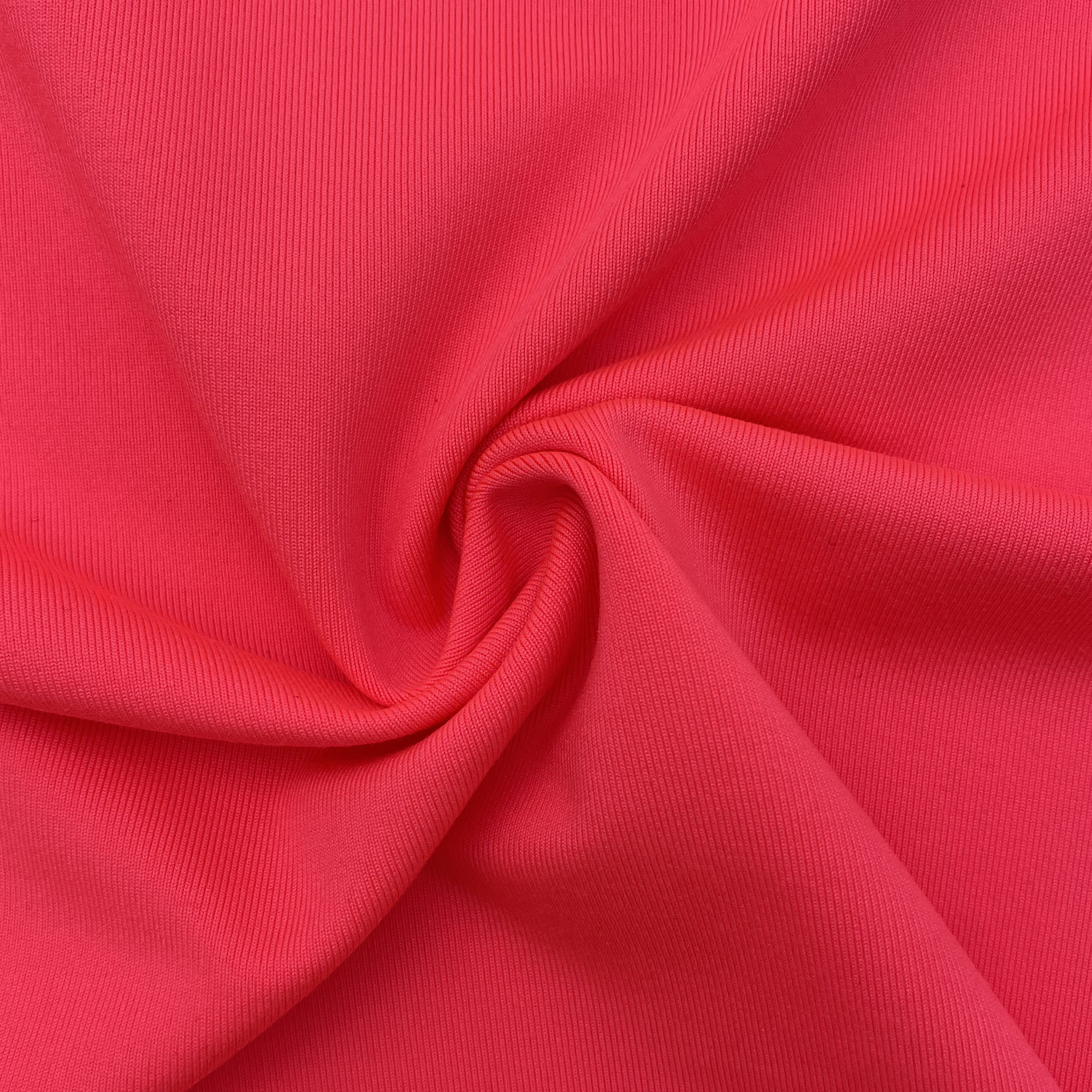 %88 POLYESTER %12 SPANDEX AĞIRLIK:200GSM GENİŞLİK:155CM NEON PEMBE TEK JERSEY KUMAŞ